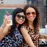 Rooftop Party, NYC, Women, Friends, Celebration, Urban Lifestyle, Cityscape, Nightlife, Fun, Socializing, Candid Moments, Outdoor Event, City Lights, Fashion, Style, Trendy, Night Out, Happy Faces, Candid Photography, City Views, Entertainment, Event, Festivities