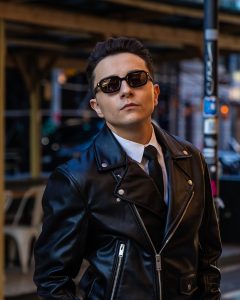 Candid Portrait of a man in Soho NYC. Street photography in NYC.