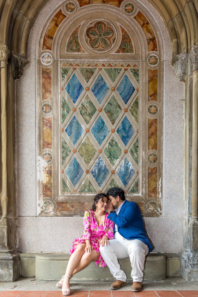 Shot documentary-style in Central Park, this candid photo captures an authentic, unposed moment between two people deeply in love.