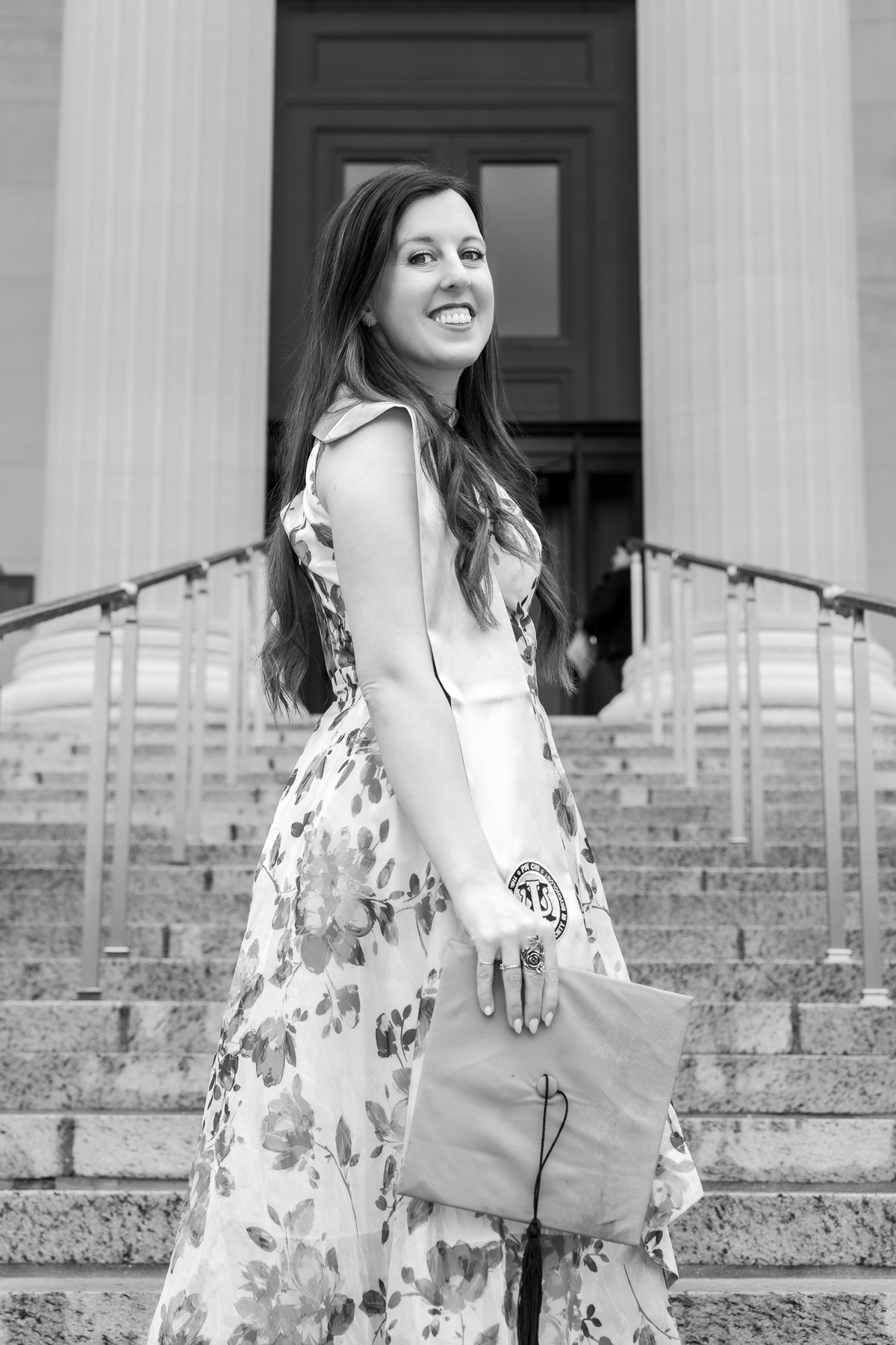 University Portrait of a woman smiling documentary style black and white
