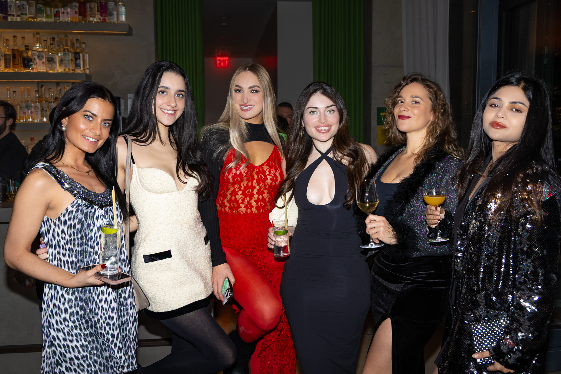 Editorial-style group portrait at a Brooklyn Christmas party.