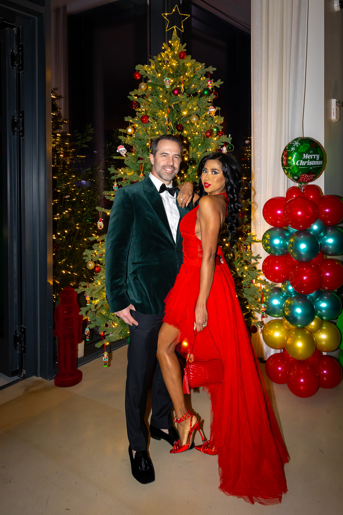 Guests posing for a portrait at a Christmas party in Brooklyn.