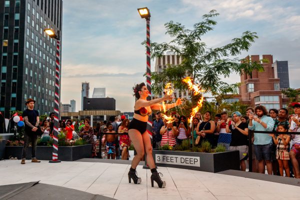 Rooftop party holiday celebration fire entertainment